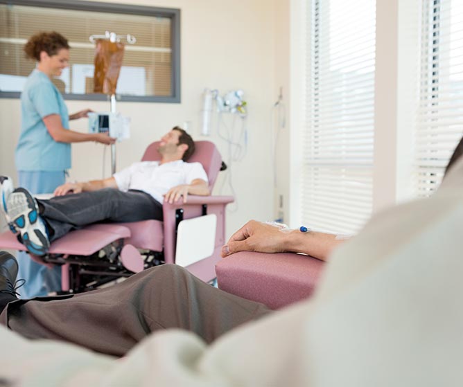 Patients receiving treatment inside an infusion suite