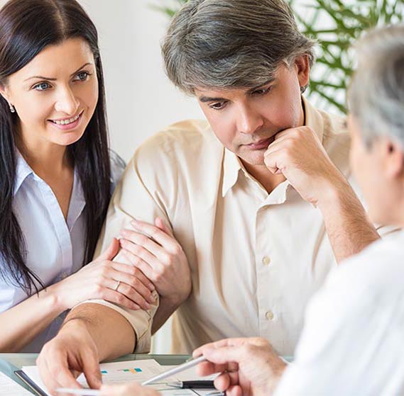 Husband and wife going over insurance coverage