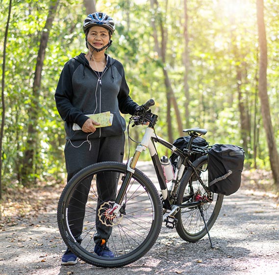 Woman riding her bike in the country