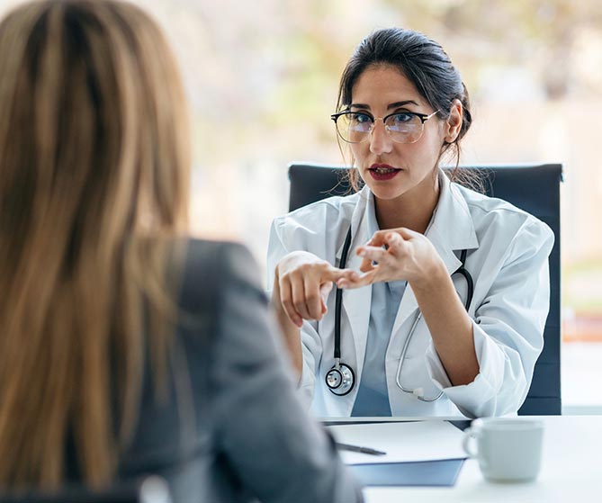 Doctor explaining infusion options to a patient