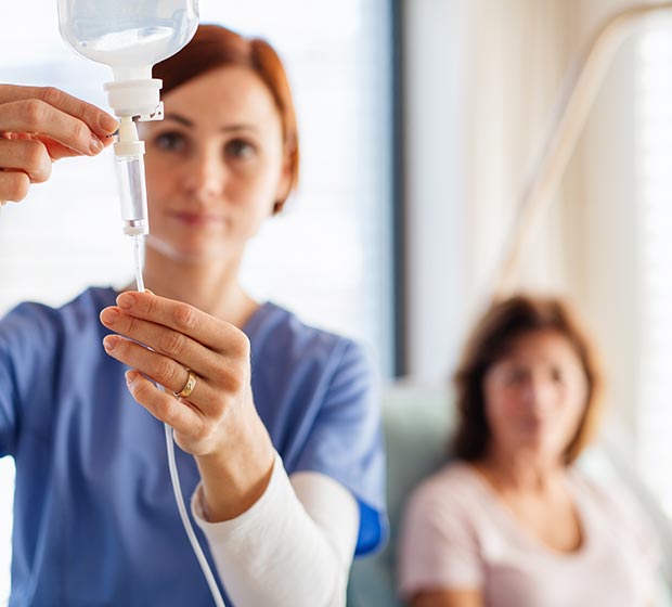 Woman receiving cemotherapy treatment